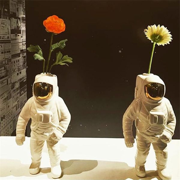 vases space man astronaut vase ceramic model unique dried flowers white for table decor tool
vases space man astronaut vase ceramic model unique dried flowers white for table decor tool