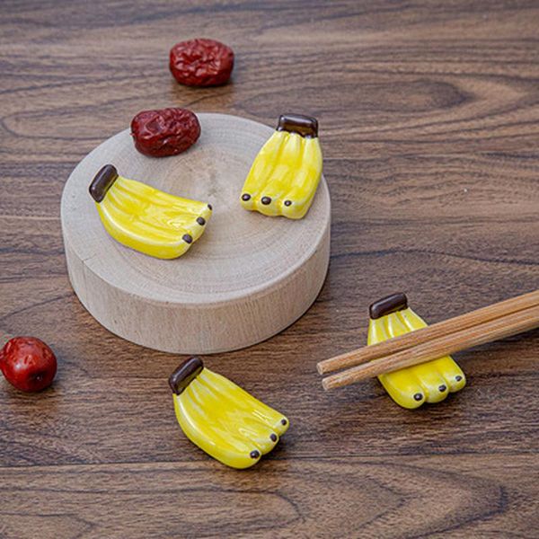chopsticks 1 pcs creative yellow bananas ceramic holder cute fruit and vegetable ornaments kitchentableware arrival
chopsticks 1 pcs creative yellow bananas ceramic holder cute fruit and vegetable ornaments kitchentableware arrival