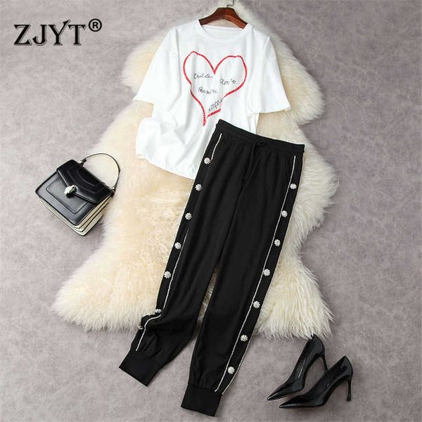 summer designers casual outfits women fashion diamonds loose white t shirt and pants suit 2 piece matching sets 210601
summer designers casual outfits women fashion diamonds loose white t shirt and pants suit 2 piece matching sets 210601