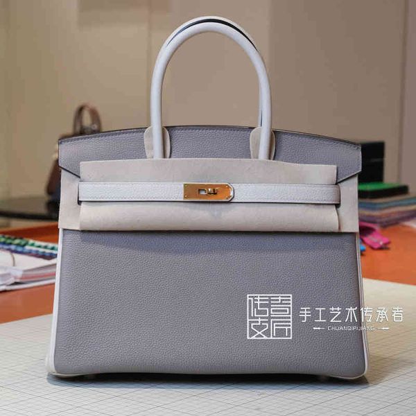 designer handbags 2021 pure handmade bag togo leather litchi pattern asphalt gray color matching gold buckle bk30cm herme handbag bb
designer handbags 2021 pure handmade bag togo leather litchi pattern asphalt gray color matching gold buckle bk30cm herme handbag bb