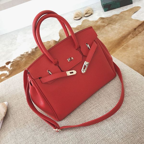 litchi pattern 2021 new fashion women's hand big kelly one shoulder messenger bridal bag
litchi pattern 2021 new fashion women's hand big kelly one shoulder messenger bridal bag