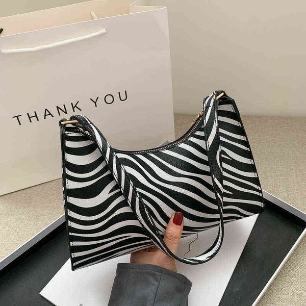 fashion zebra print women luxury handbag pu leather simple underarm shoulder bags female daily design baguette totes purse pouch
fashion zebra print women luxury handbag pu leather simple underarm shoulder bags female daily design baguette totes purse pouch