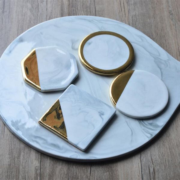 mats & pads nordic style gold-plated marbled ceramic teacup coasters creative insulation pad for drinks(round)
mats & pads nordic style gold-plated marbled ceramic teacup coasters creative insulation pad for drinks(round)