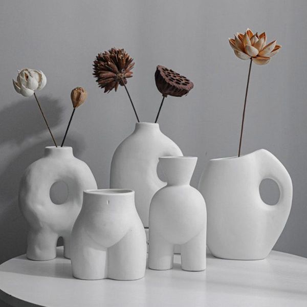 vases dried flower decoration living room art vase home ceramic creative modern irregular arrangement 
vases dried flower decoration living room art vase home ceramic creative modern irregular arrangement