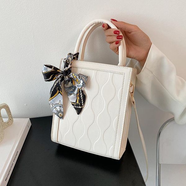 evening bags elegant female solid color tote bag 2021 summer quality pu leather women's designer handbag ribbon shoulder messenger
evening bags elegant female solid color tote bag 2021 summer quality pu leather women's designer handbag ribbon shoulder messenger