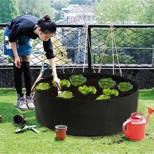 

Felt Fabric Raised Garden Bed 50 Gallons Round Planting Container Grow Bags Breathable Fabric Planter Pot for Plants Nursery Pot