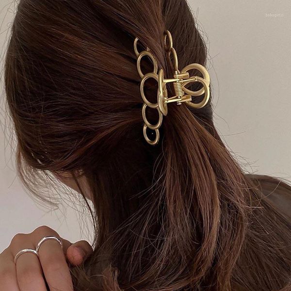 1pcs fashion hollow alloy five circle hair claw clamps retro crab female headwear simple geometric styling clips1
1pcs fashion hollow alloy five circle hair claw clamps retro crab female headwear simple geometric styling clips1