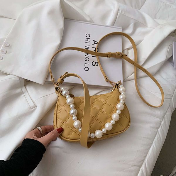 designer storage bagdame ling 2021 new tide, embroider line bag zipper summer elegant joker pearls worn popular one shoulder and female bag
designer storage bagdame ling 2021 new tide, embroider line bag zipper summer elegant joker pearls worn popular one shoulder and female bag