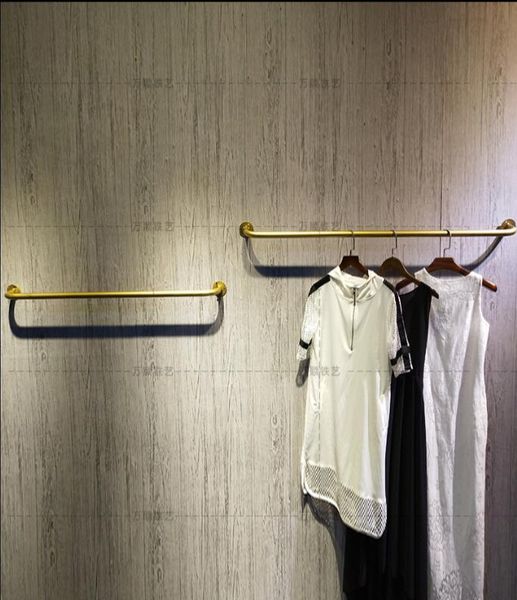 hangers & racks clothing store display rack upper wall gold hanging clothes pole hanger
hangers & racks clothing store display rack upper wall gold hanging clothes pole hanger