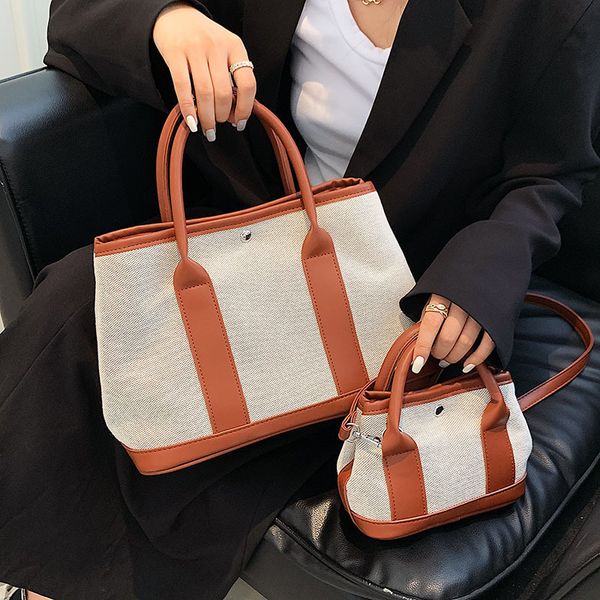 luxury handbags artistic temperament large capacity handbag women's bag 2021 summer new texture color matching single shoulder messenge
luxury handbags artistic temperament large capacity handbag women's bag 2021 summer new texture color matching single shoulder messenge