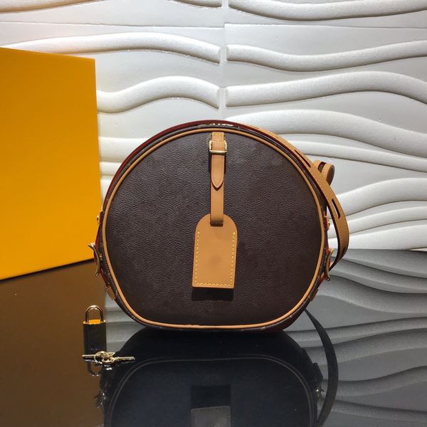 boite chapeau souple mm shoulder bag coated canvas exterior and aged natural cowhide trim with a leather luggage tag 45647
boite chapeau souple mm shoulder bag coated canvas exterior and aged natural cowhide trim with a leather luggage tag 45647