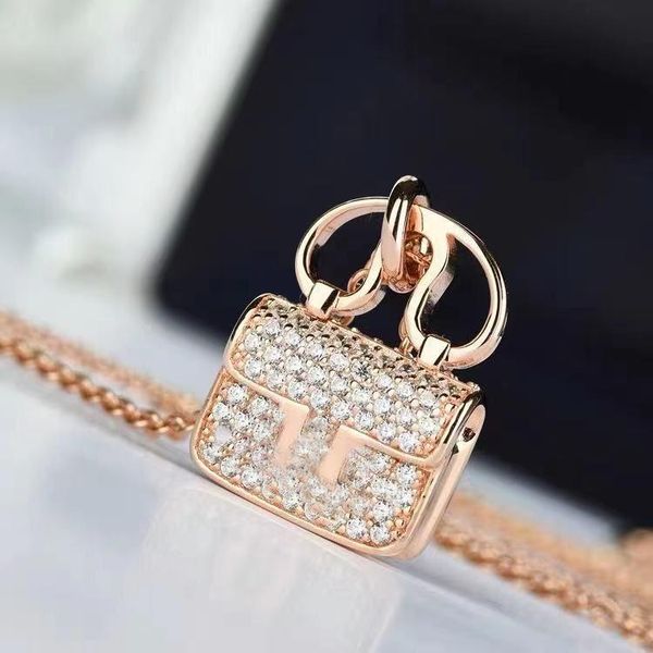 fashion luxury diamond pendant exquisite mini bag h letter necklace with original gift box packaging, Silver
fashion luxury diamond pendant exquisite mini bag h letter necklace with original gift box packaging, Silver
