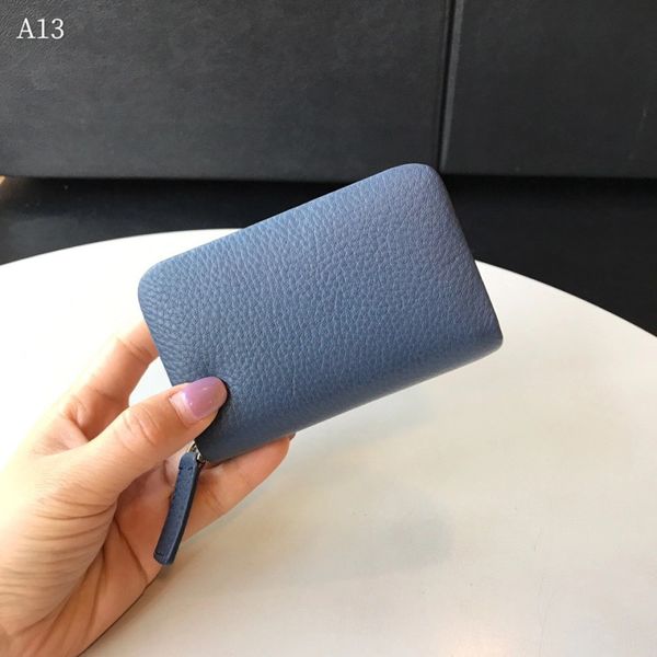 the first bag coin purse simple card short zipper leather layer lychee small european and american cowhide pattern muuew
the first bag coin purse simple card short zipper leather layer lychee small european and american cowhide pattern muuew