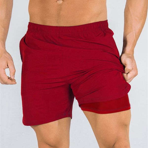 solid color shorts men jogging fitness summer male workout training quick dry sport gym short pants running, Black;blue
solid color shorts men jogging fitness summer male workout training quick dry sport gym short pants running, Black;blue
