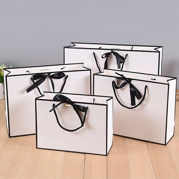 gift wrap thickened bag, tote paper white cardboard clothing lightweight high-end with bow-knot
gift wrap thickened bag, tote paper white cardboard clothing lightweight high-end with bow-knot