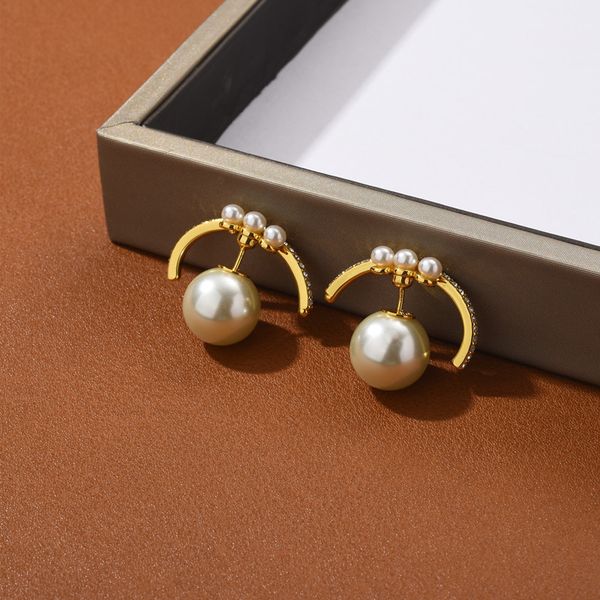 design jewelry word personality super fairy net red earrings d. two pearl earrings on the front and back, Golden
design jewelry word personality super fairy net red earrings d. two pearl earrings on the front and back, Golden