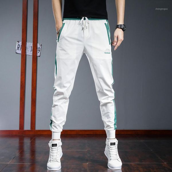 men's pants summer casual ice sports korean trend slim trousers black thin white stripe 
men's pants summer casual ice sports korean trend slim trousers black thin white stripe