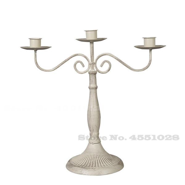 candle holders american retro metal western restaurants candlelight dinners 1/3/5 sticks iron table decorations
candle holders american retro metal western restaurants candlelight dinners 1/3/5 sticks iron table decorations