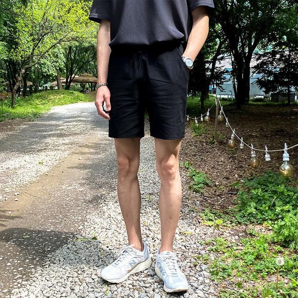 men's shorts loose elastic waist solid five-point pants man's korean fashion lace-up short man simple black beach for men 2021, White;black
men's shorts loose elastic waist solid five-point pants man's korean fashion lace-up short man simple black beach for men 2021, White;black