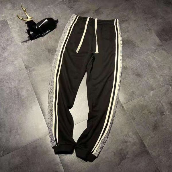 ancient + autumn new snake pattern side webbing splicing sports leisure loose men's and women's pants, Black;white
ancient + autumn new snake pattern side webbing splicing sports leisure loose men's and women's pants, Black;white
