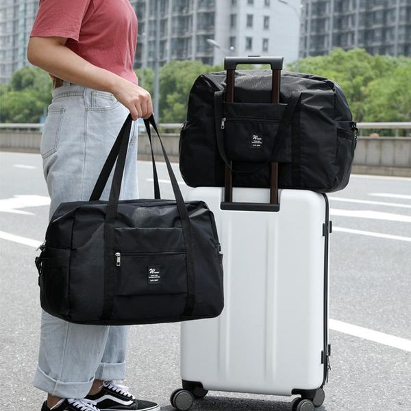 anreisha travel bag men and women business trip short-distance large-capacity waterproof folding portable one-shoulder luggage duffel bags
anreisha travel bag men and women business trip short-distance large-capacity waterproof folding portable one-shoulder luggage duffel bags