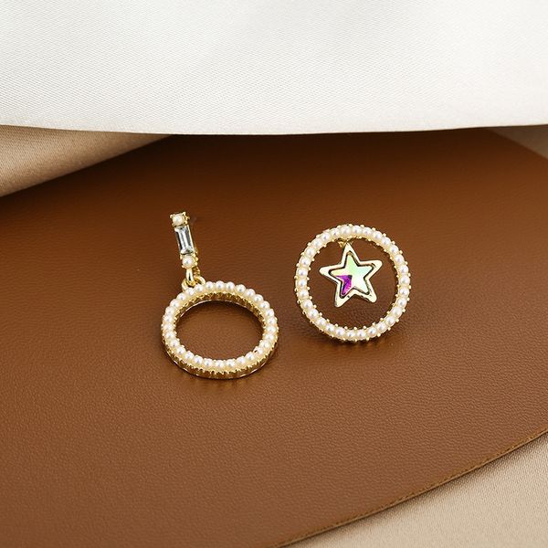 925 silver needle shining star pearl asymmetric personality creativity hollow out round earrings net red new earrings
925 silver needle shining star pearl asymmetric personality creativity hollow out round earrings net red new earrings