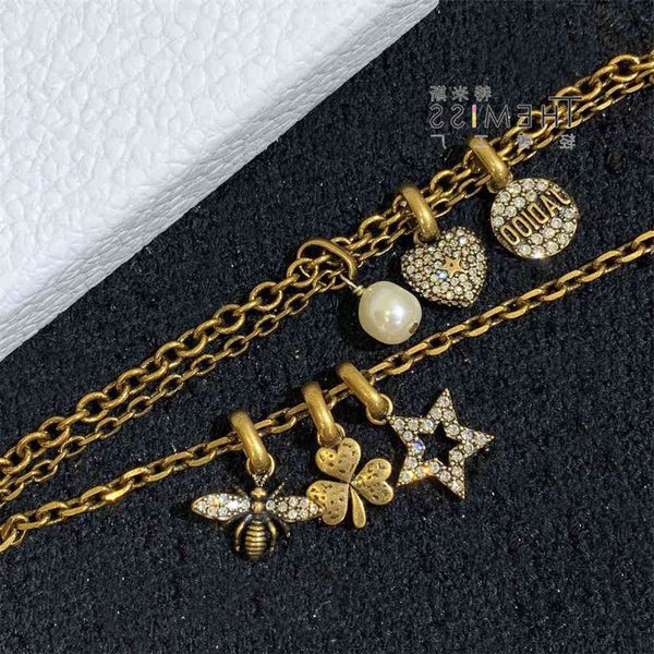 fashion bracelet d family / di multi layer irregular bee star pendant, Golden;silver
fashion bracelet d family / di multi layer irregular bee star pendant, Golden;silver