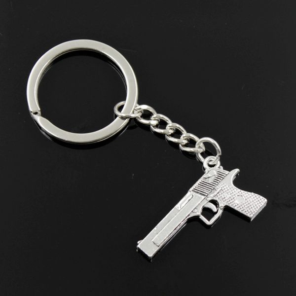 new fashion men 30mm keychain diy metal holder chain vintage gun browning pistol 45x20mm silver color pendant gift
new fashion men 30mm keychain diy metal holder chain vintage gun browning pistol 45x20mm silver color pendant gift