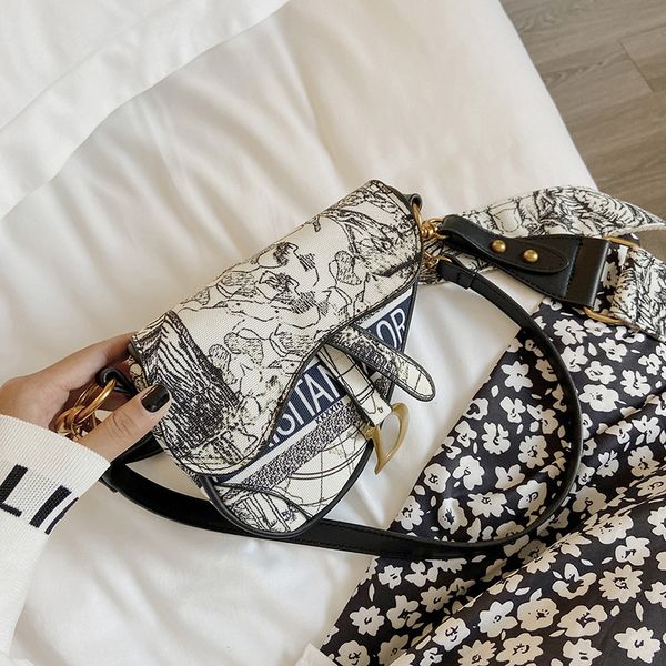 designer female new printed canvas portable saddle bag fashion letter embroidered armpit single shoulder messenger bag handbags outlet
designer female new printed canvas portable saddle bag fashion letter embroidered armpit single shoulder messenger bag handbags outlet