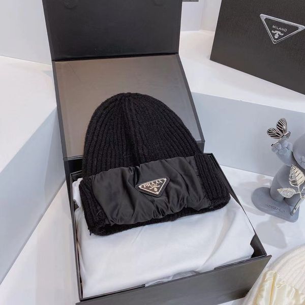 triangle standard stitched satin out the street lovers warm thickened knitted winter hat
triangle standard stitched satin out the street lovers warm thickened knitted winter hat