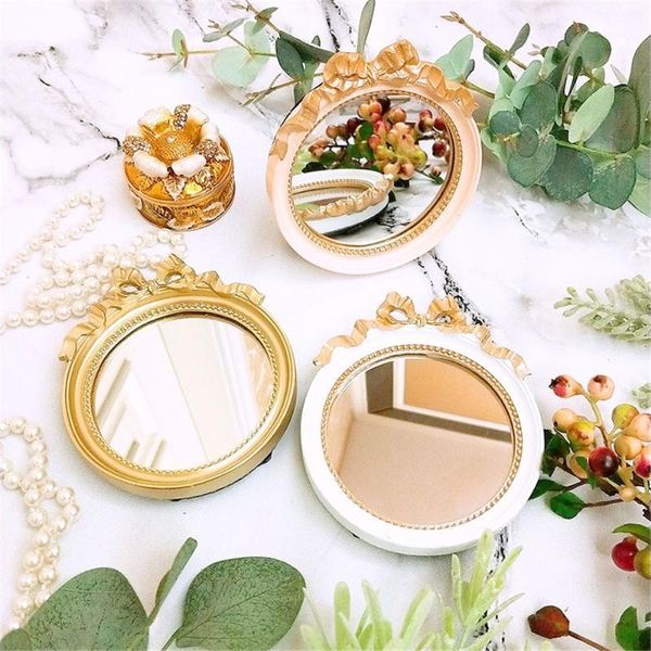 european style retro sweet bow mirror creative portable earrings display rack dessert cake plate decorative mirrors1
european style retro sweet bow mirror creative portable earrings display rack dessert cake plate decorative mirrors1