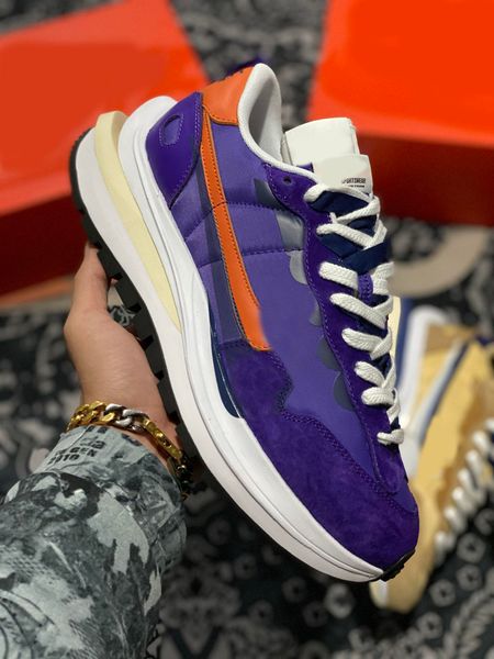 2021 authentic sacai vaporwaffle men sneakers dark iris campfire orange white sesame blue void outdoor sports shoes with original box
2021 authentic sacai vaporwaffle men sneakers dark iris campfire orange white sesame blue void outdoor sports shoes with original box