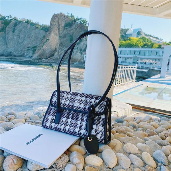 designer bags french single shoulder underarm women's messenger bag foreign temperament 2021 new checked tide bag
designer bags french single shoulder underarm women's messenger bag foreign temperament 2021 new checked tide bag
