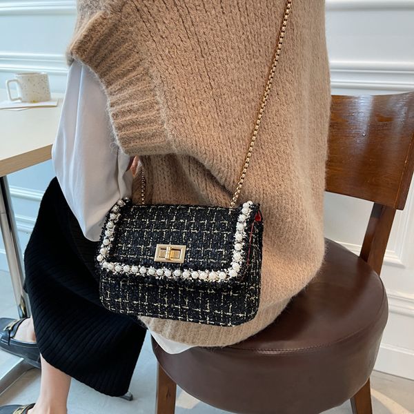 ins xiaoxiangfeng lock chain 2021 early autumn single shoulder messenger small square bag sweet woven pearl women's
ins xiaoxiangfeng lock chain 2021 early autumn single shoulder messenger small square bag sweet woven pearl women's