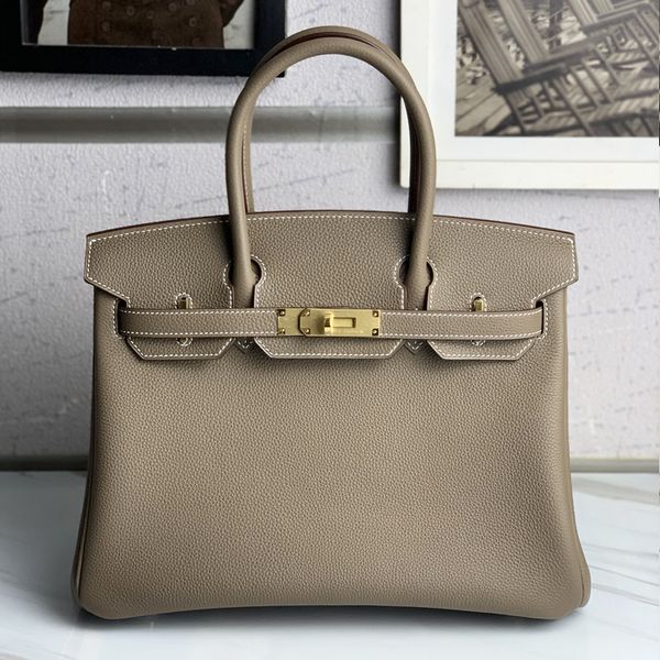 high-end cowhide bag german imported calf togo lychee pattern 25 30 35 handmade womens bag
high-end cowhide bag german imported calf togo lychee pattern 25 30 35 handmade womens bag