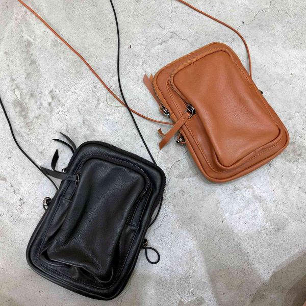 handmade leather mobile phone bag single shoulder messenger bag women's style 
handmade leather mobile phone bag single shoulder messenger bag women's style