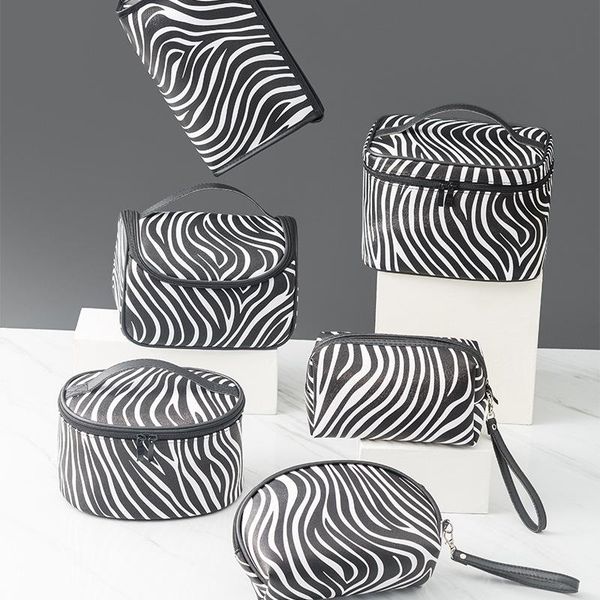 storage bags fashion simple portable cosmetic bag in black and white zebra large capacity travel wash gargle to receive package
storage bags fashion simple portable cosmetic bag in black and white zebra large capacity travel wash gargle to receive package