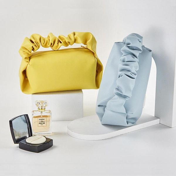 storage bags 2021 ins pure color simple portable cloud handbag niche texture pvc leather fold female cosmetic bag wholesale
storage bags 2021 ins pure color simple portable cloud handbag niche texture pvc leather fold female cosmetic bag wholesale