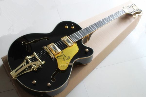 jazz hollow thick body electric guitar with large rocker in gold pink wrap in white and black optional
jazz hollow thick body electric guitar with large rocker in gold pink wrap in white and black optional