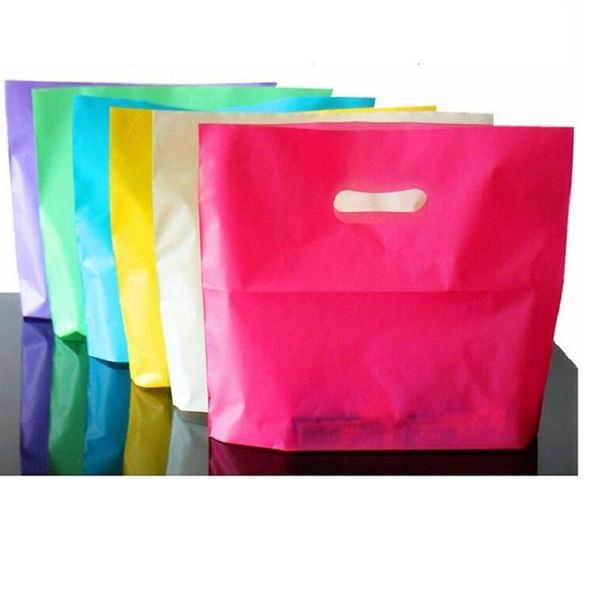 gift wrap 50pcs/lot colorful plastic shopping bags with handle pink boutique clothes packaging
gift wrap 50pcs/lot colorful plastic shopping bags with handle pink boutique clothes packaging
