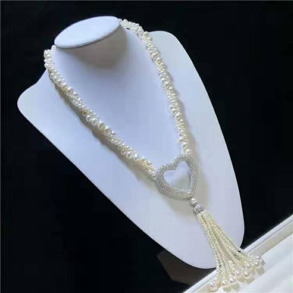 chains hand knotted white distorted natural freshwater pearl peach heart micro inlay zircon tassel sweater chain necklace 74-76cm, Silver
chains hand knotted white distorted natural freshwater pearl peach heart micro inlay zircon tassel sweater chain necklace 74-76cm, Silver