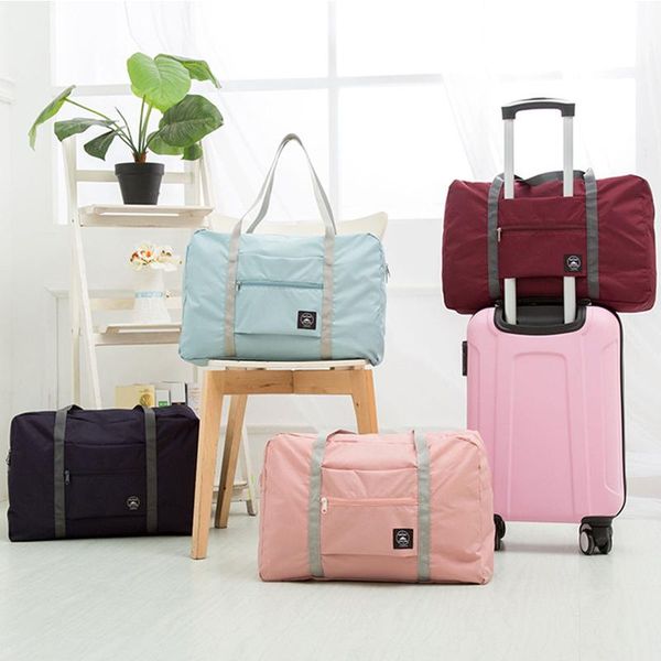 trolley travel bag foldable waterproof nylon luggage large capacity women folding handbags storage bags
trolley travel bag foldable waterproof nylon luggage large capacity women folding handbags storage bags