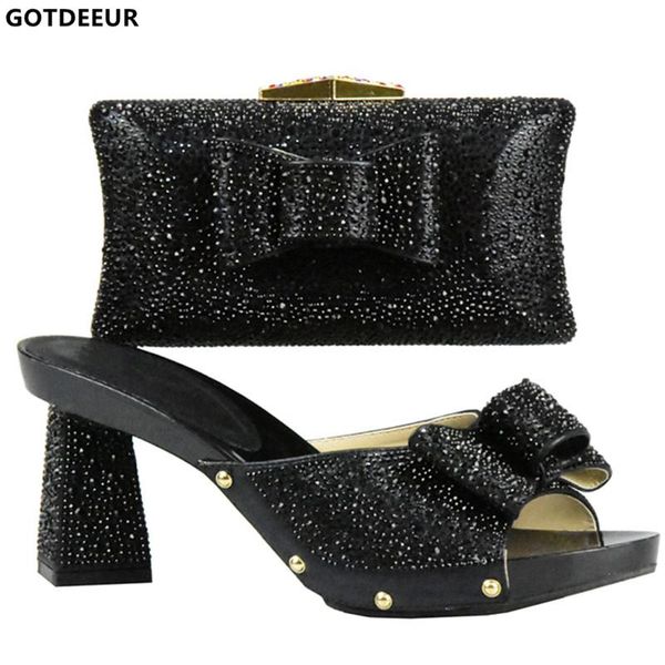 dress shoes latets slip on black color matching and bag set decorated with rhinestone african shoe to match for parties
dress shoes latets slip on black color matching and bag set decorated with rhinestone african shoe to match for parties