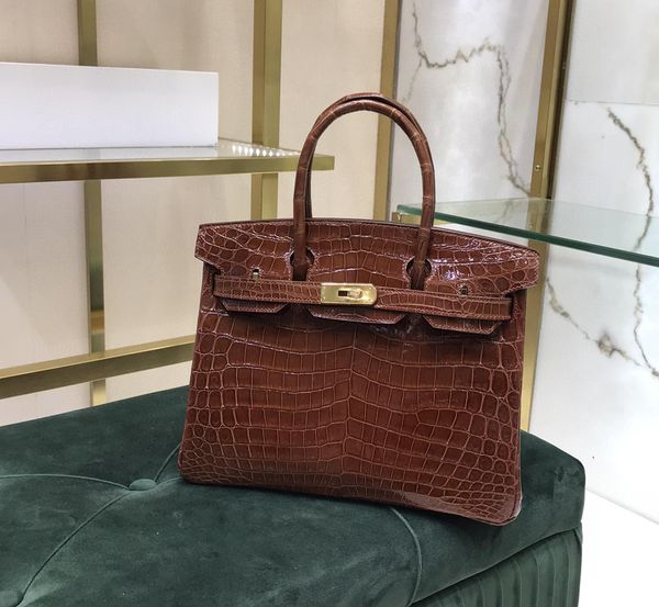 only 1pc in stcok discount price wholesale shinny crocodile desingers handbag 25cm fully handmade by 3crocodiles wax stitching gold
only 1pc in stcok discount price wholesale shinny crocodile desingers handbag 25cm fully handmade by 3crocodiles wax stitching gold