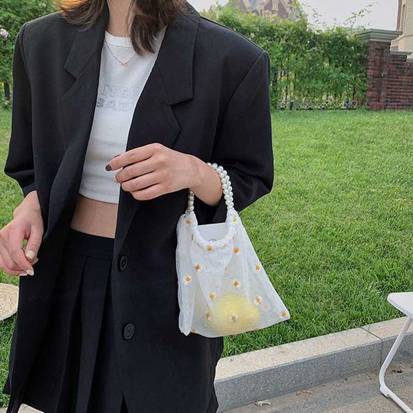 2020 fashion luxury women small transparent mesh tote bag classic chic delicate creative design daisy embroidery handbag pearl beach pouch
2020 fashion luxury women small transparent mesh tote bag classic chic delicate creative design daisy embroidery handbag pearl beach pouch