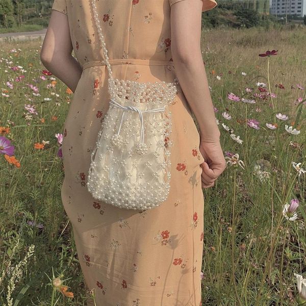 shoulder bags handmade hollow out woven beaded pearl busket solid color crossbody bag vintage acrylic handbag holiday beach lady for women
shoulder bags handmade hollow out woven beaded pearl busket solid color crossbody bag vintage acrylic handbag holiday beach lady for women