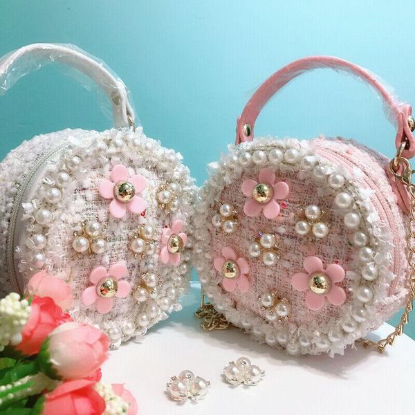 backpacks 2021 est children kids baby girl pearl flower decor design handbag shoulder messenger bag cross body round girls gift
backpacks 2021 est children kids baby girl pearl flower decor design handbag shoulder messenger bag cross body round girls gift