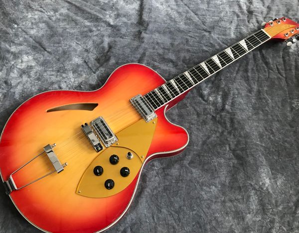 ric 330 370 6 strings cherry sunburst semi hollow body electric guitar single f hole, checkerboard binding, 2 output jacks, gold pickguard
ric 330 370 6 strings cherry sunburst semi hollow body electric guitar single f hole, checkerboard binding, 2 output jacks, gold pickguard