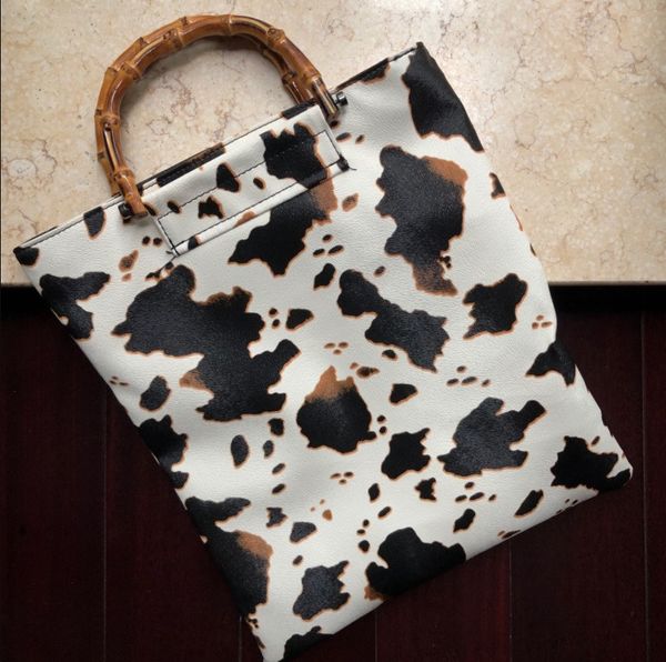 retro cow pattern women handbag designer pu leather female big totes printing large capacity shopping bag bolso feminina l003
retro cow pattern women handbag designer pu leather female big totes printing large capacity shopping bag bolso feminina l003