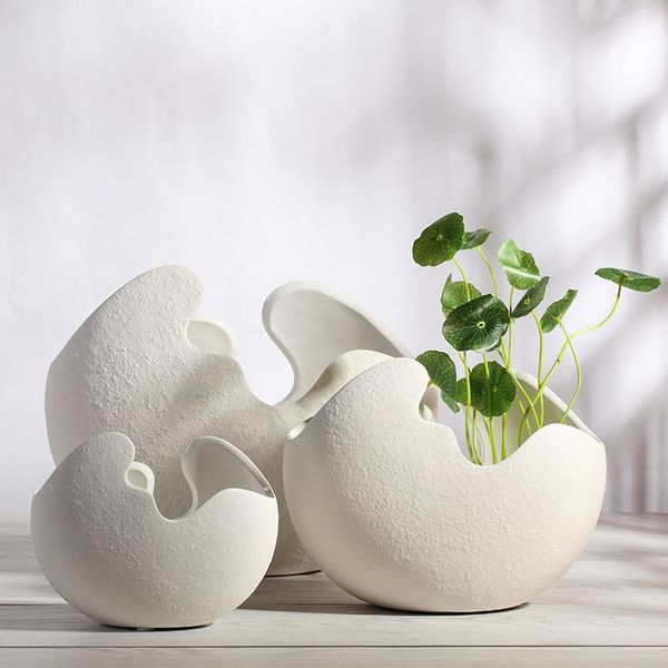 vases jingdezhen ceramics white eggshell creative modern art vase flower decoration culture room
vases jingdezhen ceramics white eggshell creative modern art vase flower decoration culture room